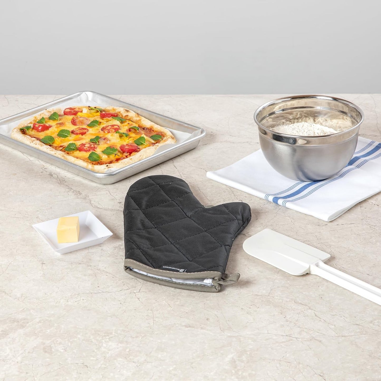 Restaurantware 13.7 x 8 Inch Heavy-Duty Oven Mitt 1 Flame Retardant Heat-Resistant Kitchen Glove - With Thumb Guard Hanging Loop Black Cotton Quilted Glove Heat-Resistant For Cooking And Baking